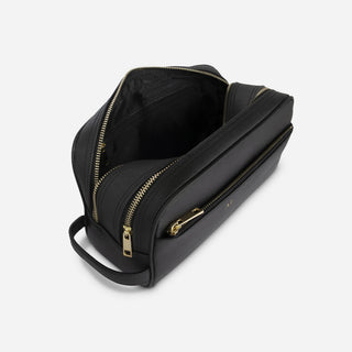 Black Saffiano leather toiletry bag with open zipped compartments