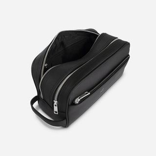 Black Saffiano leather wash bag with open zipped compartments and silver hardware