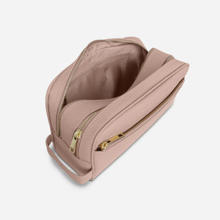 Nude Saffiano leather toiletry bag with open zipped compartments