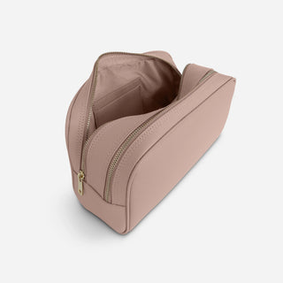 Personalised nude leather toiletry bag showing interior storage and gold zips