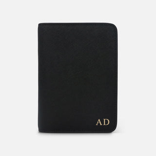 Personalised black saffiano leather passport holder with gold initials