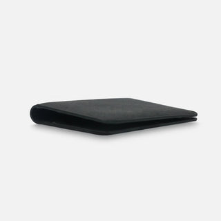 Black saffiano leather passport holder slim profile side view