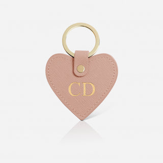 Heart-shaped keychain with 'CD' initials on a white background
